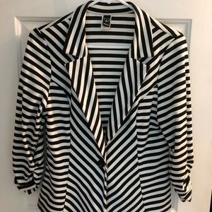 A black and white blazer size L